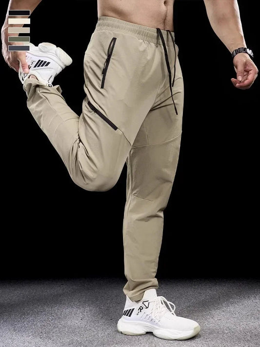 New Autumn Winter Men Quick-drying Sports Casual Trousers Gym Fitness Running Training Clothes Micro-elastic Zipper Pocket Pants 7 Sister Stars LLC