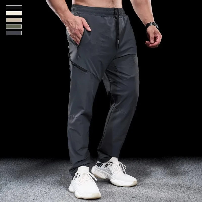 New Autumn Winter Men Quick-drying Sports Casual Trousers Gym Fitness Running Training Clothes Micro-elastic Zipper Pocket Pants 7 Sister Stars LLC