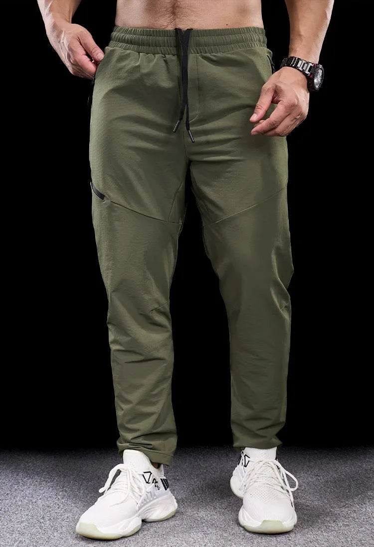 New Autumn Winter Men Quick-drying Sports Casual Trousers Gym Fitness Running Training Clothes Micro-elastic Zipper Pocket Pants 7 Sister Stars LLC