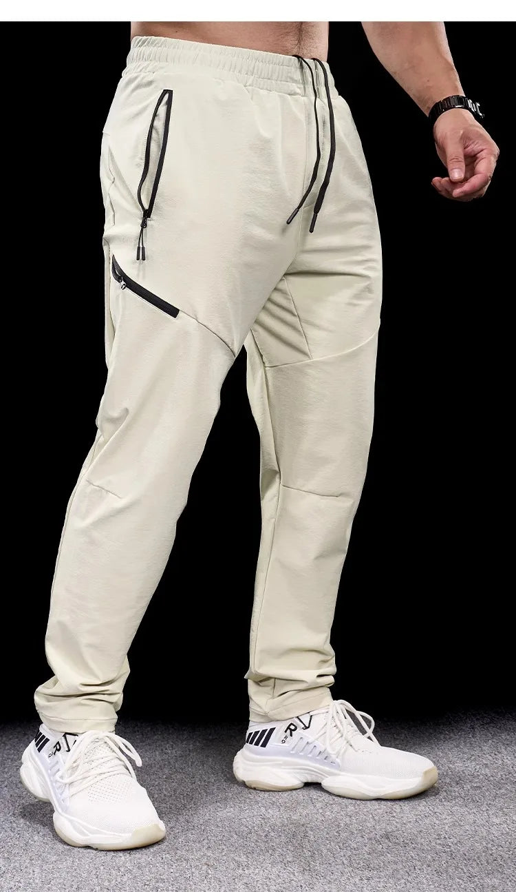 New Autumn Winter Men Quick-drying Sports Casual Trousers Gym Fitness Running Training Clothes Micro-elastic Zipper Pocket Pants 7 Sister Stars LLC