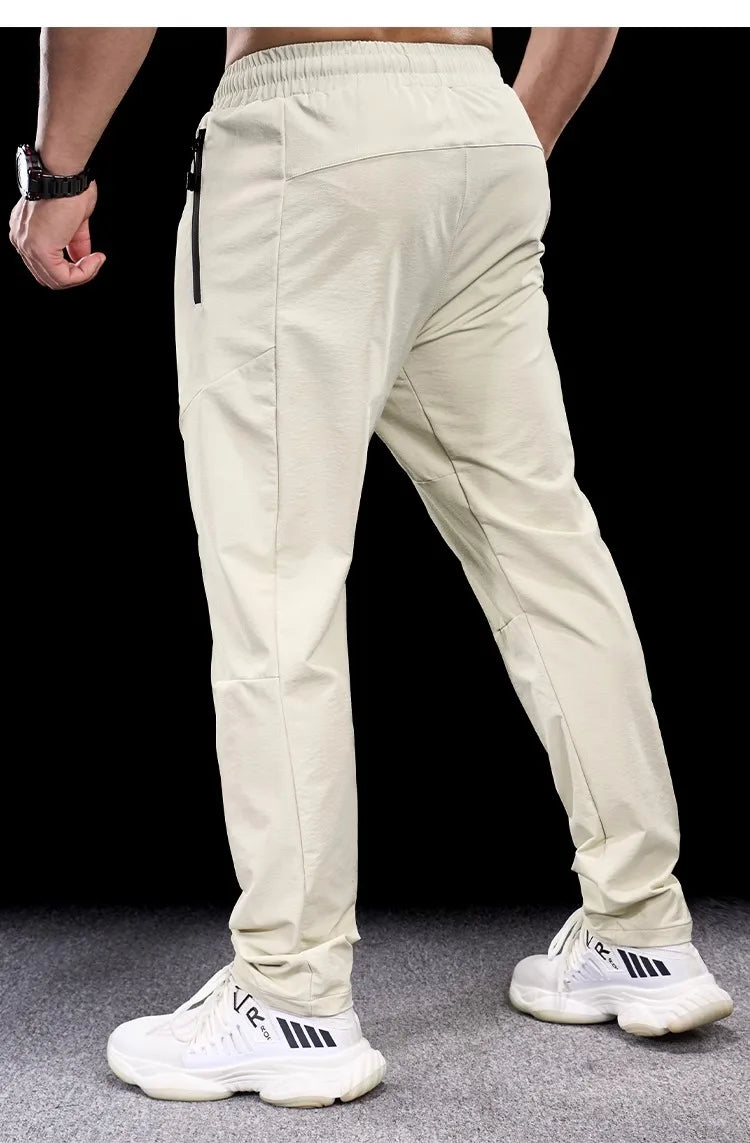 New Autumn Winter Men Quick-drying Sports Casual Trousers Gym Fitness Running Training Clothes Micro-elastic Zipper Pocket Pants 7 Sister Stars LLC