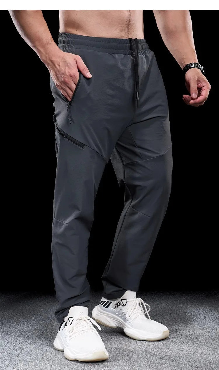 New Autumn Winter Men Quick-drying Sports Casual Trousers Gym Fitness Running Training Clothes Micro-elastic Zipper Pocket Pants 7 Sister Stars LLC