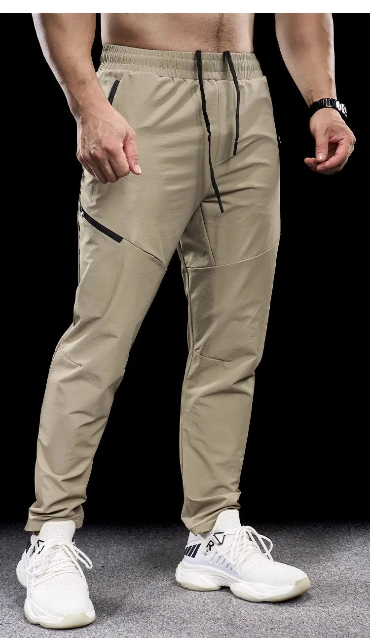 New Autumn Winter Men Quick-drying Sports Casual Trousers Gym Fitness Running Training Clothes Micro-elastic Zipper Pocket Pants 7 Sister Stars LLC