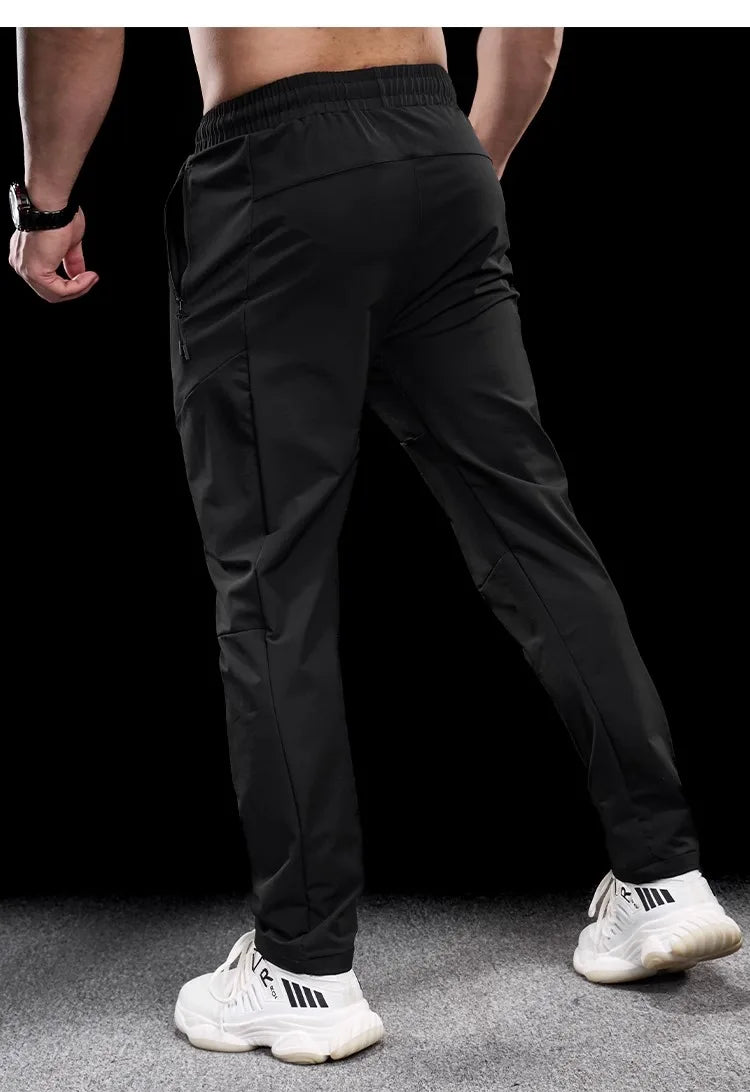 New Autumn Winter Men Quick-drying Sports Casual Trousers Gym Fitness Running Training Clothes Micro-elastic Zipper Pocket Pants 7 Sister Stars LLC