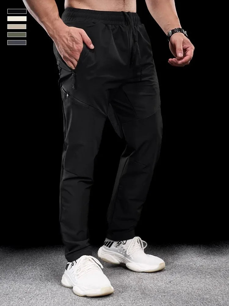 New Autumn Winter Men Quick-drying Sports Casual Trousers Gym Fitness Running Training Clothes Micro-elastic Zipper Pocket Pants 7 Sister Stars LLC