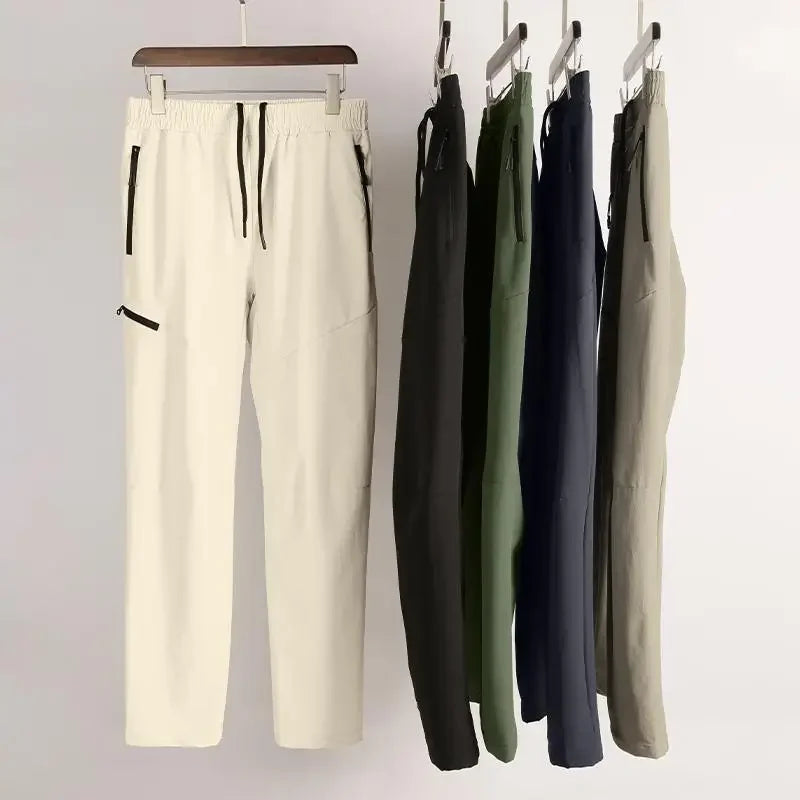 New Autumn Winter Men Quick-drying Sports Casual Trousers Gym Fitness Running Training Clothes Micro-elastic Zipper Pocket Pants 7 Sister Stars LLC