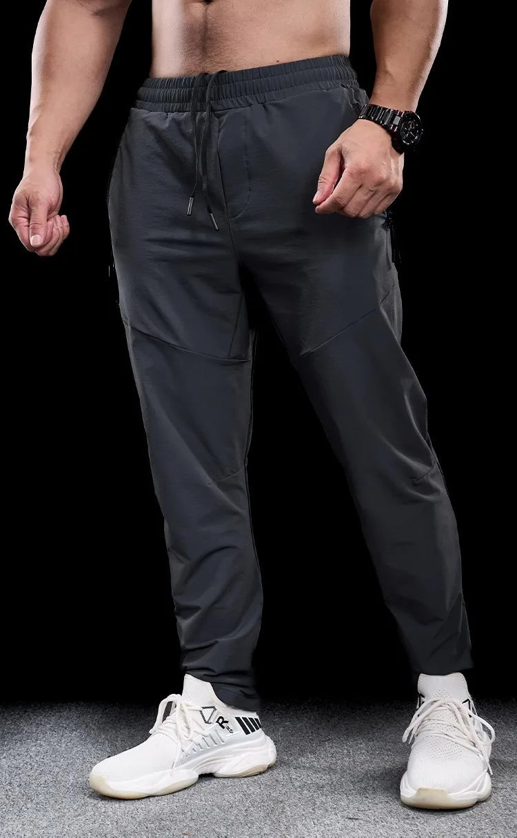 New Autumn Winter Men Quick-drying Sports Casual Trousers Gym Fitness Running Training Clothes Micro-elastic Zipper Pocket Pants 7 Sister Stars LLC
