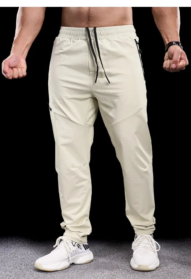 New Autumn Winter Men Quick-drying Sports Casual Trousers Gym Fitness Running Training Clothes Micro-elastic Zipper Pocket Pants 7 Sister Stars LLC